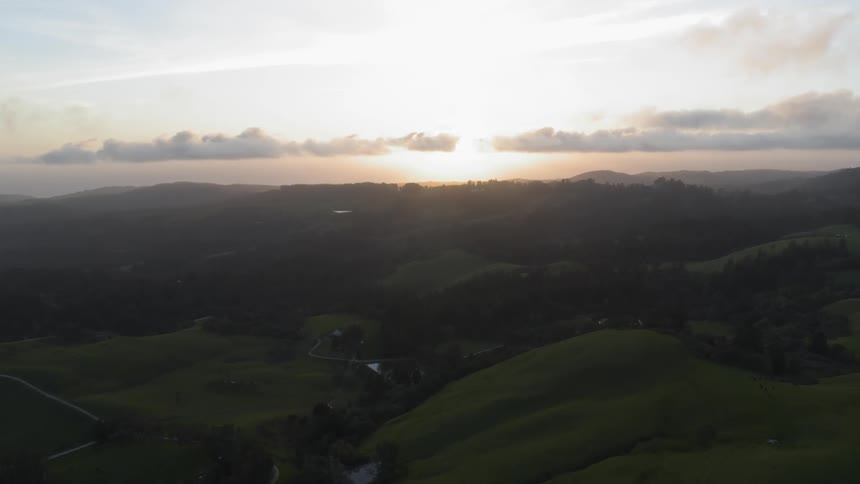 Bucolic valley countryside at low sun