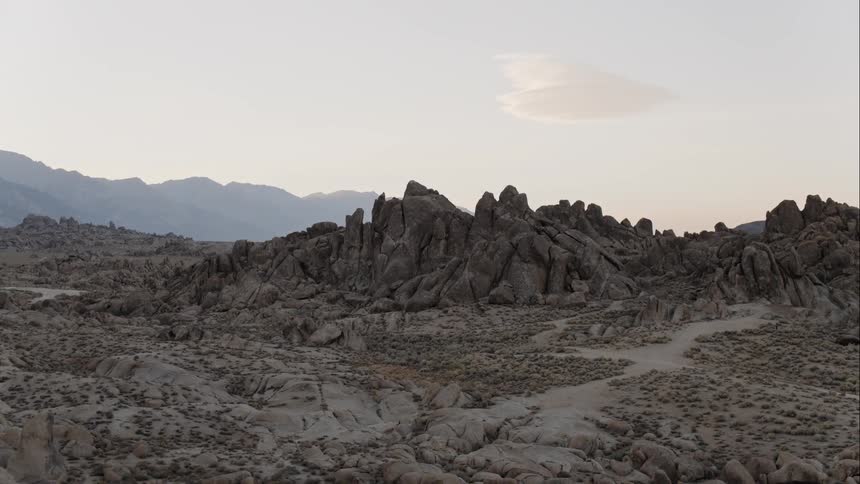 A barren stretch of rock soil and hills