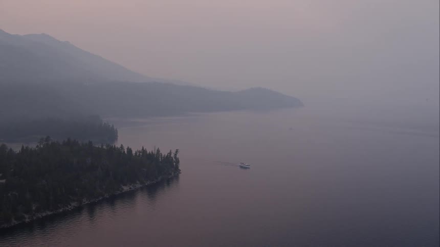 Aerial shot of a lake at dawn