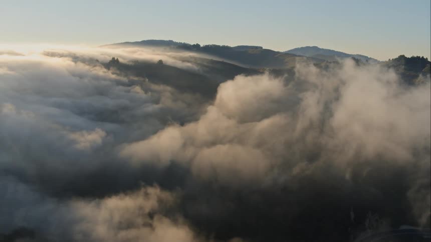 Clouds form on top of mountains