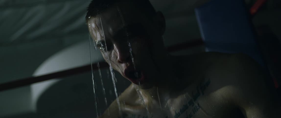 A man has water poured over his head