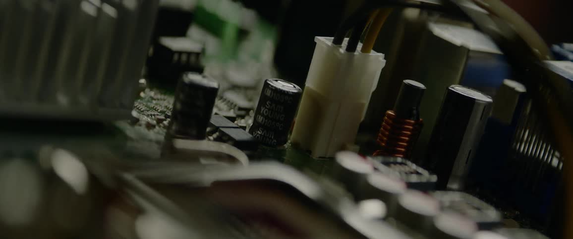 A circuit board lightly illuminated