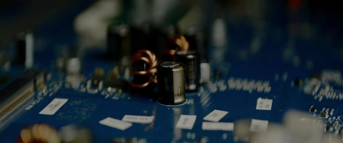 On the surface of a printed circuit board a group of capacitors are clustered together