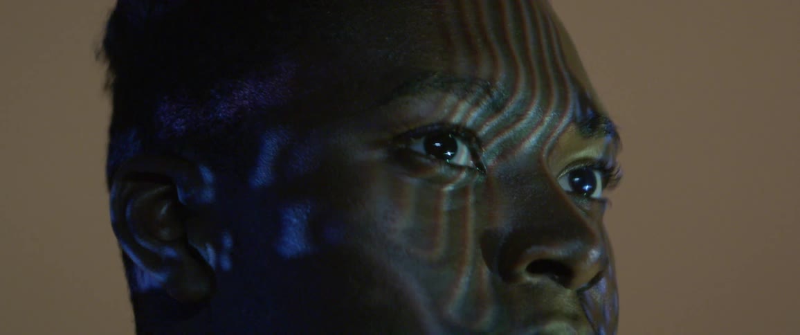 Images peing projected on a persons face