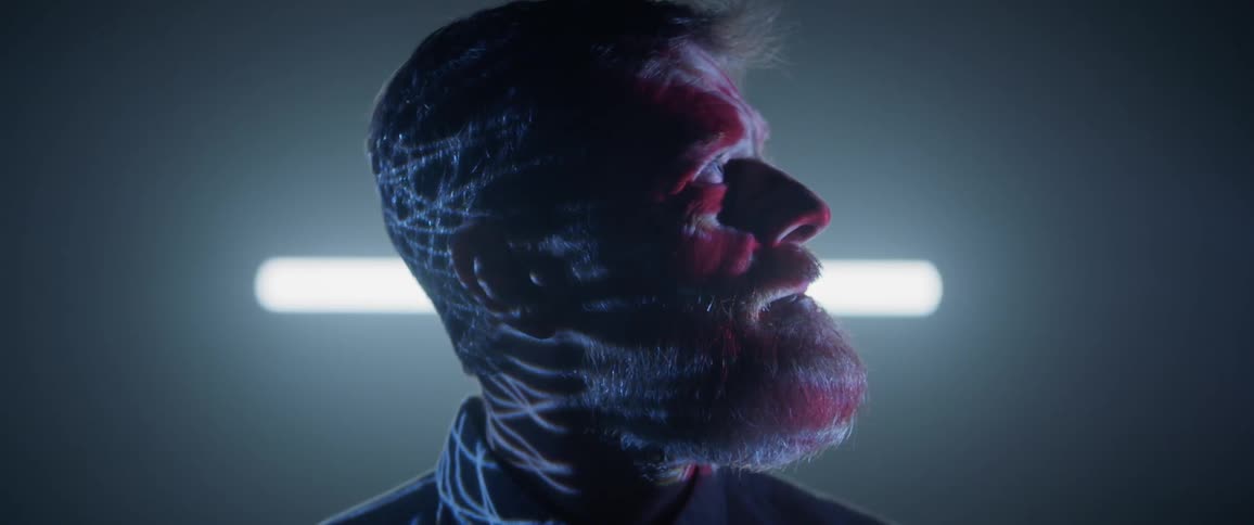 Shot of a person with images being projected onto him