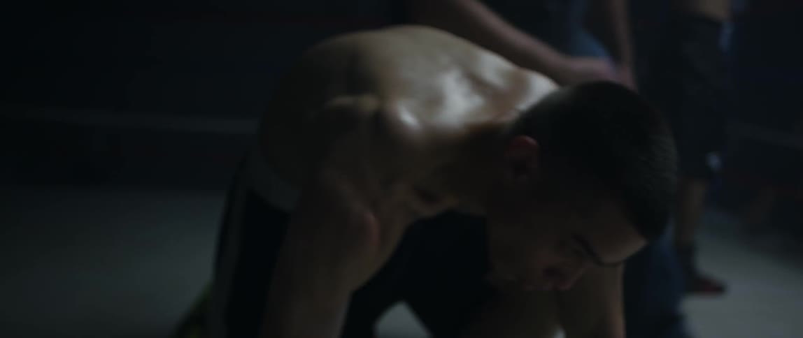 A boxer being counted out in a match
