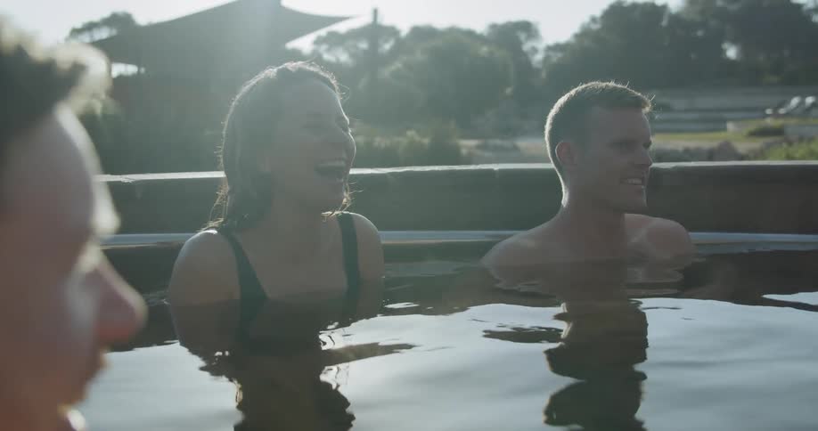 Friends hang out in the water