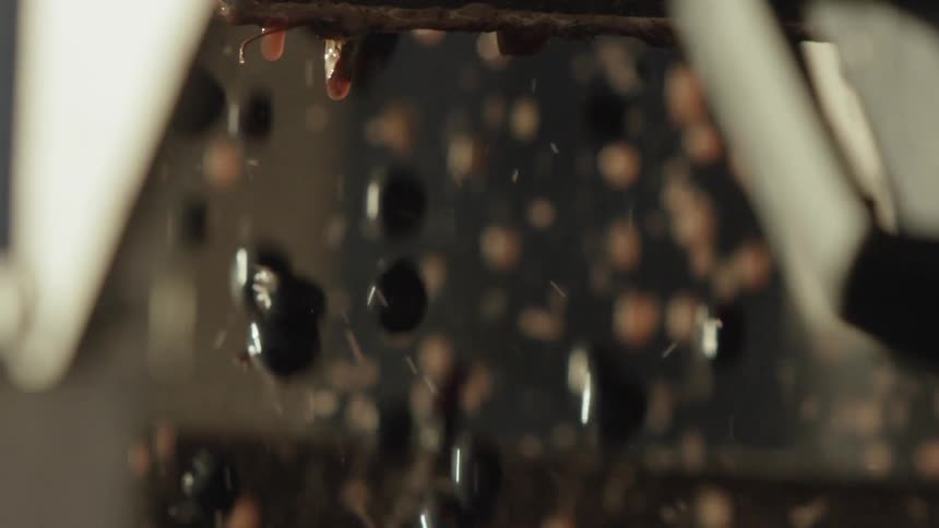 Close up of coffee dripping in a coffee maker