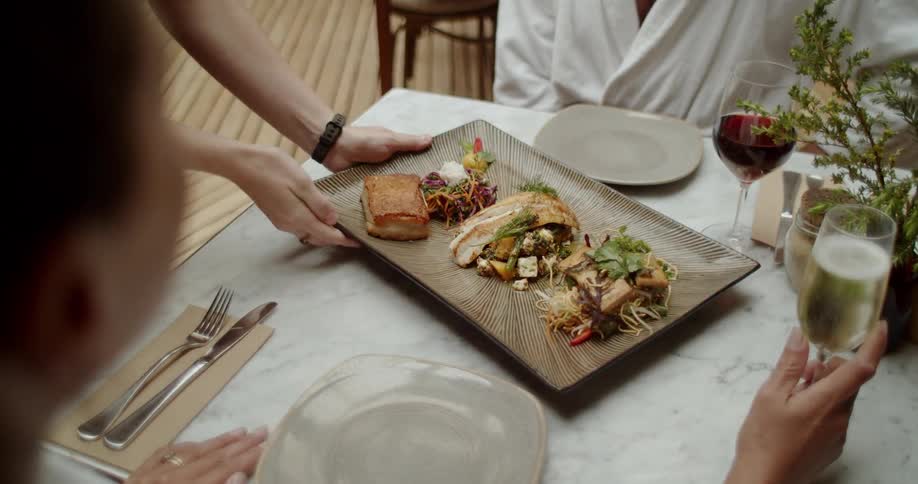 A meal is placed in the center of the table