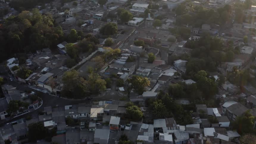 A crowded suburb full of houses buildings and streets