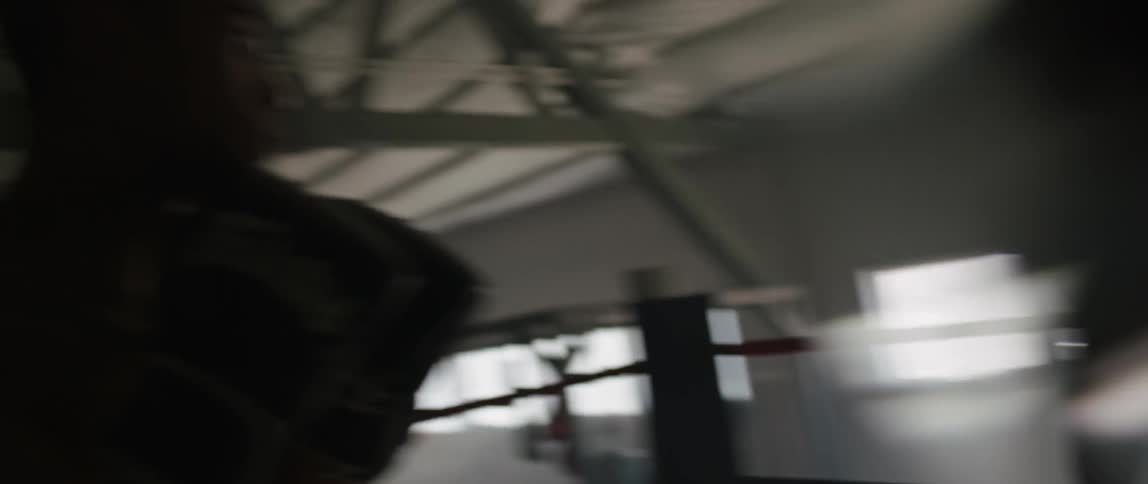 Boxers spar in a boxing ring