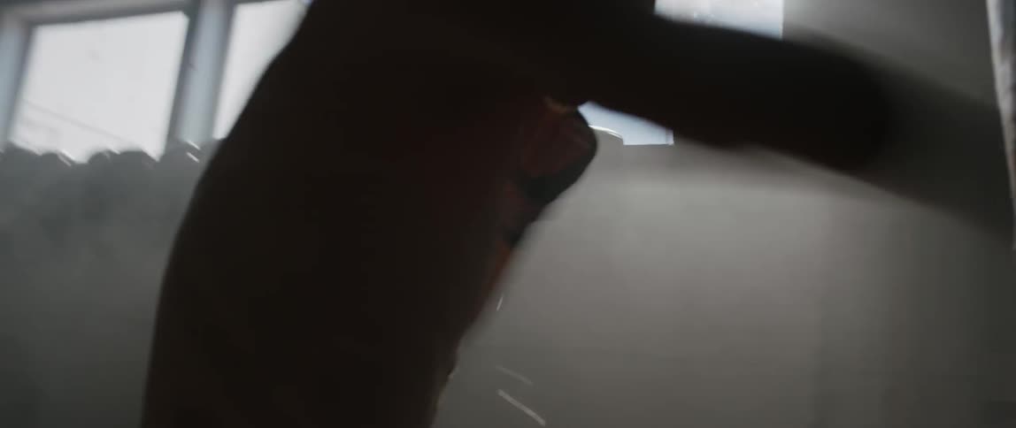 Man hits a punching bag