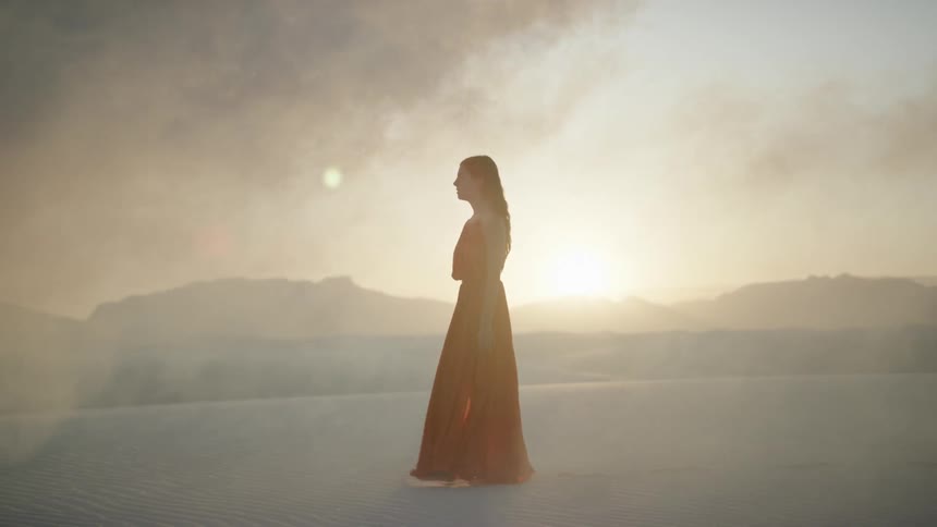 Girl walking in the desert