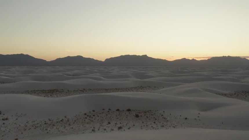 Aerial shot of a desert at dawn