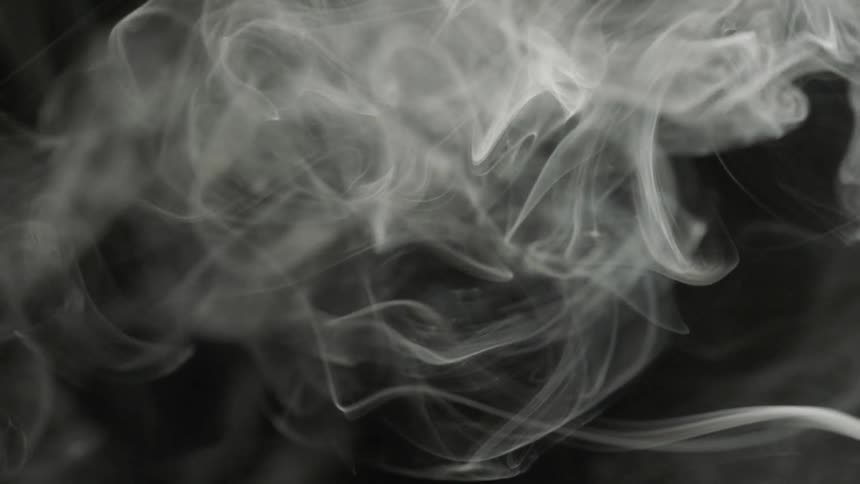 Smoke swirling in a studio environment