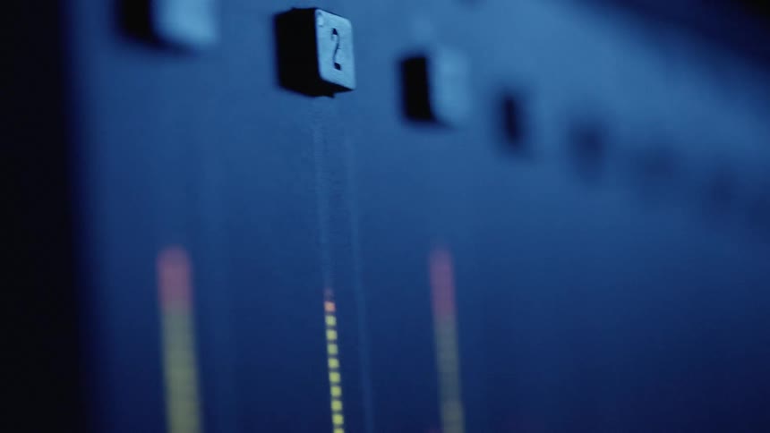 A mixing desk displays signal values