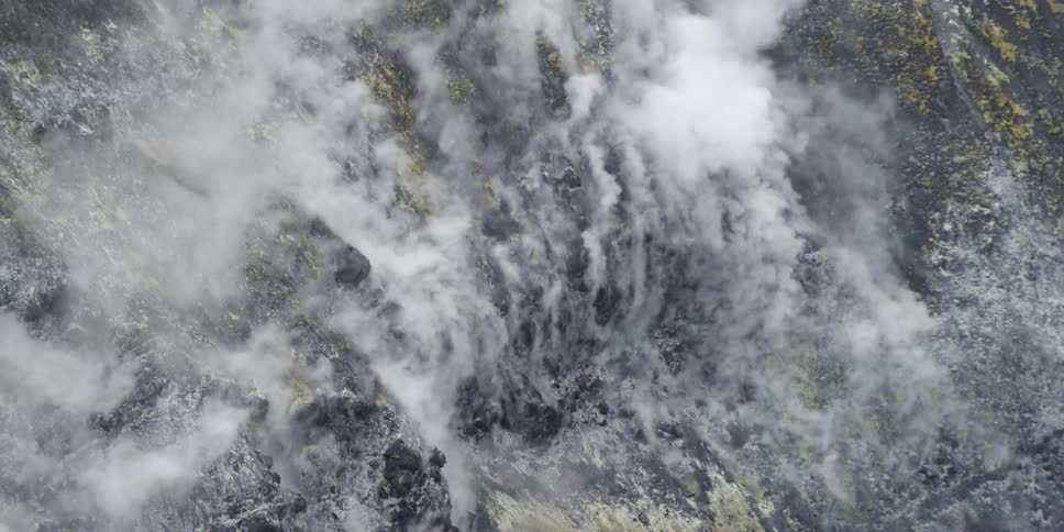 Steam rising from the ground