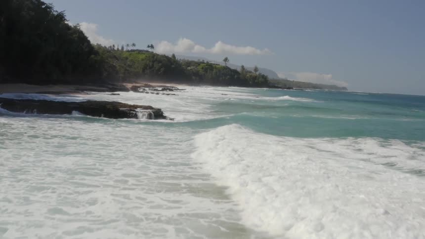 Waves crashing towards the shore