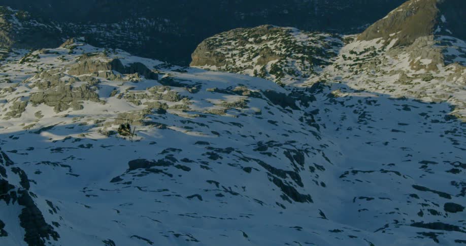 An aerial view of icy mountain