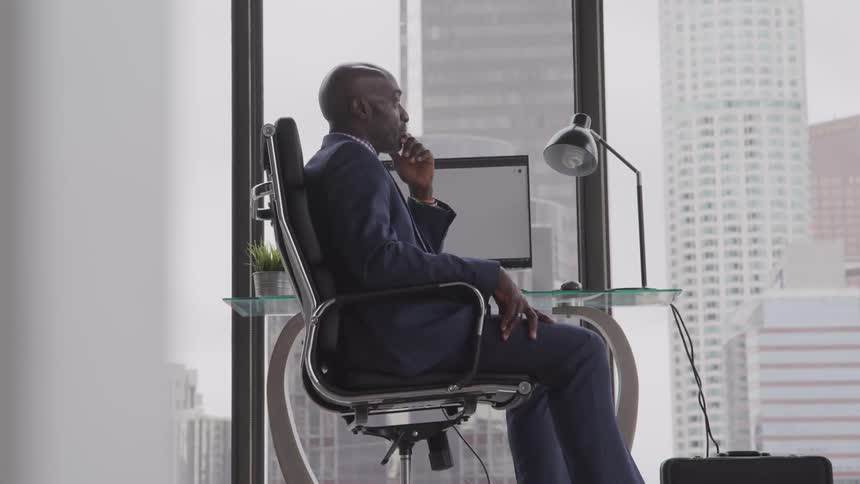A man with suit full of thought