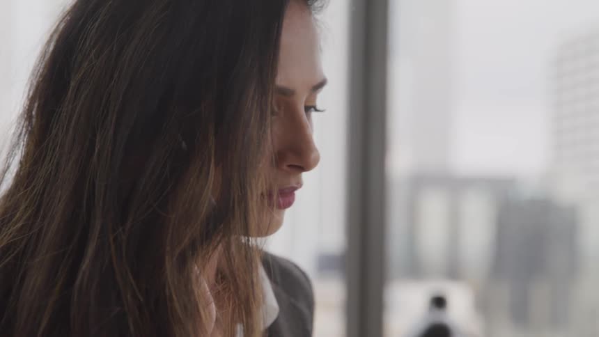 A female worker walking in the office