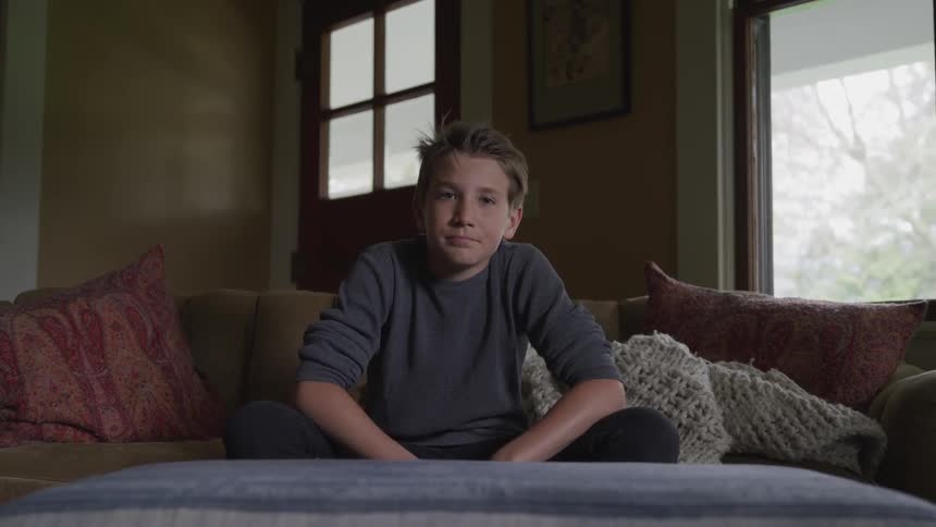 A child looks to the camera