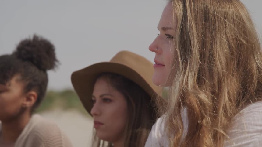 Group of women staring at the sky