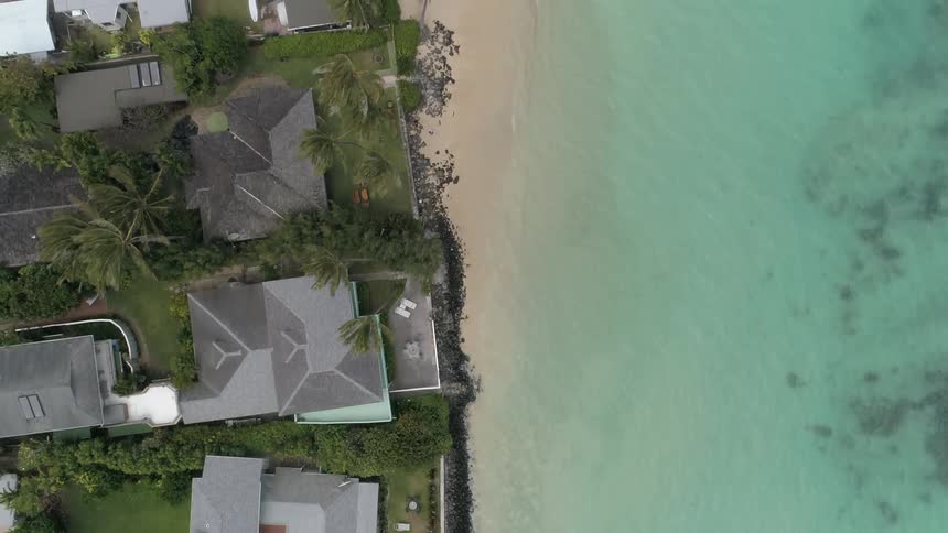 Many buildings sit overlooking the ocean