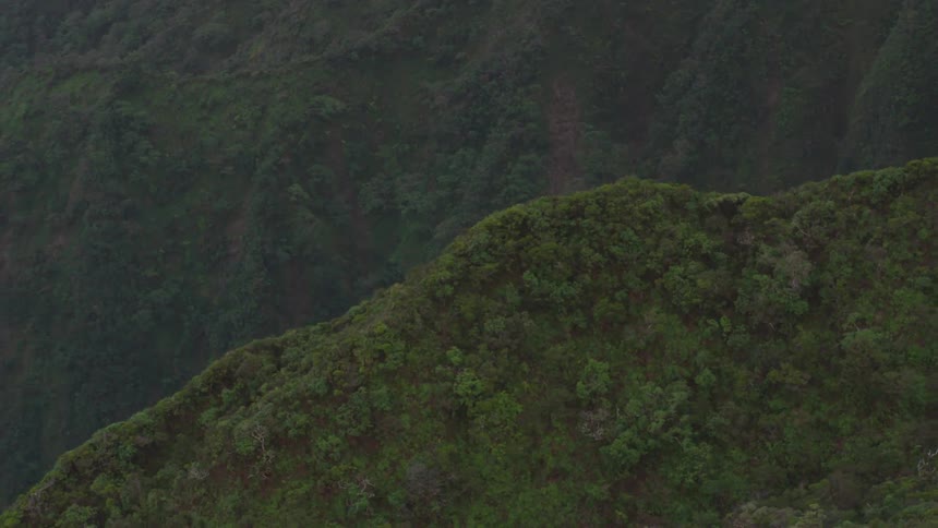 An aerial scenery of a mountain range apex