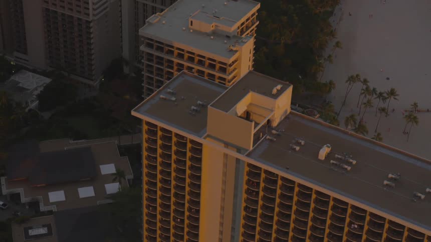 Passing over hotels and high rises on a tropical beach