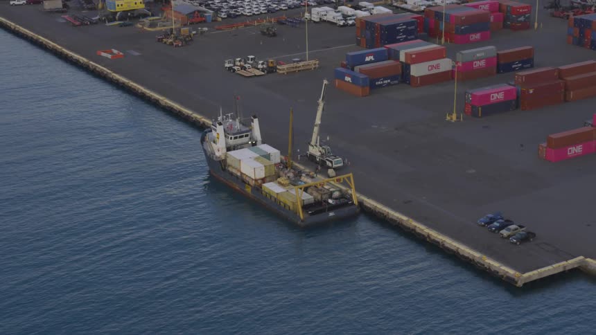 Shipping and cargo boxes at a dock