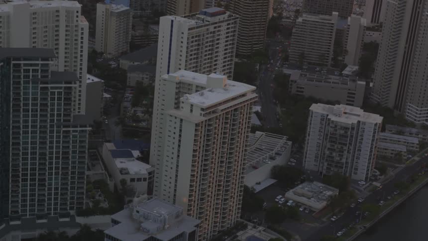 An aerial view of a downtown area is displayed