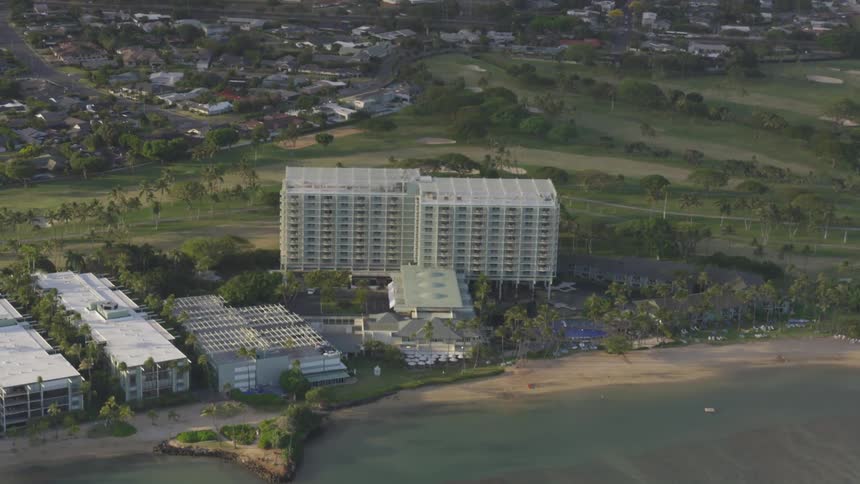 A town is near the coast with buildings right on the shore