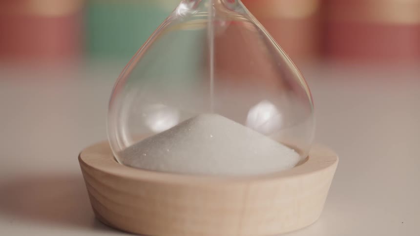 Close up of a timer filling with sand