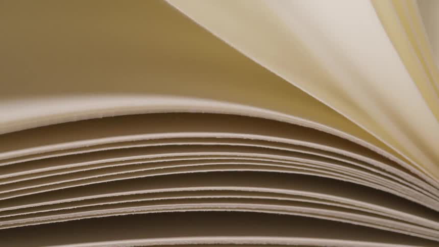 Pages from a book are turned