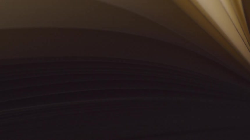 Blank pages of a book flipping
