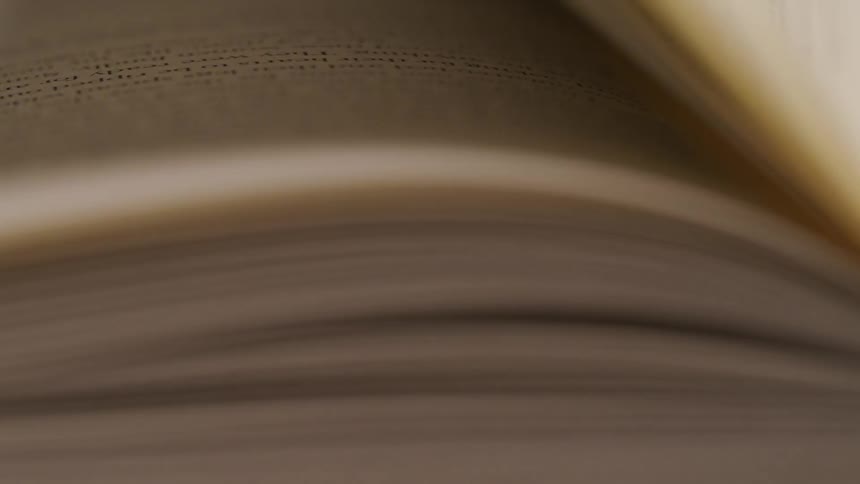 The pages of the book are flipping