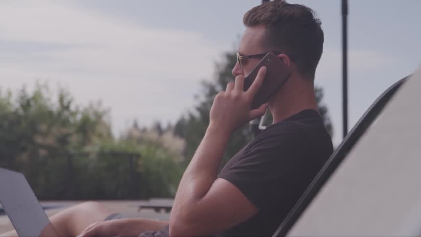 A man talks on his phone