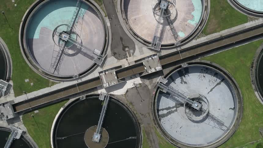An aerial view of clarifies settling tanks