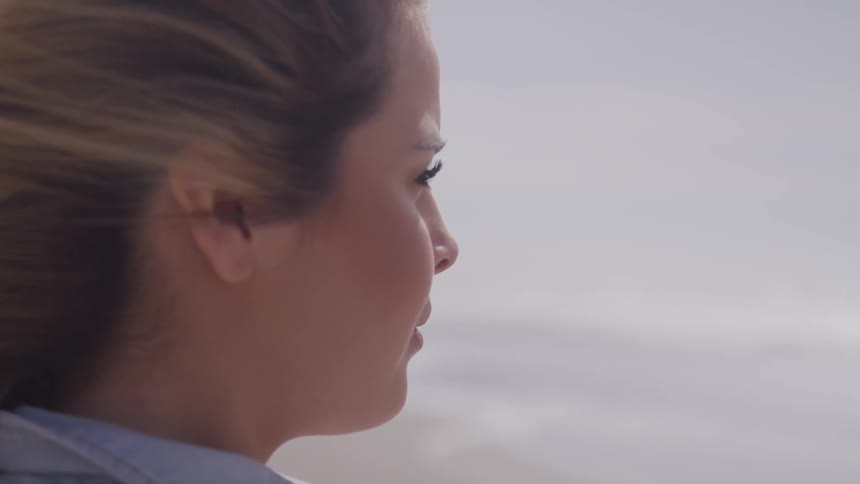 Woman standing near the beach