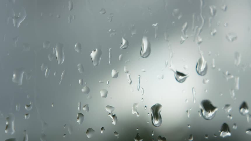 Water beads on a glass surface