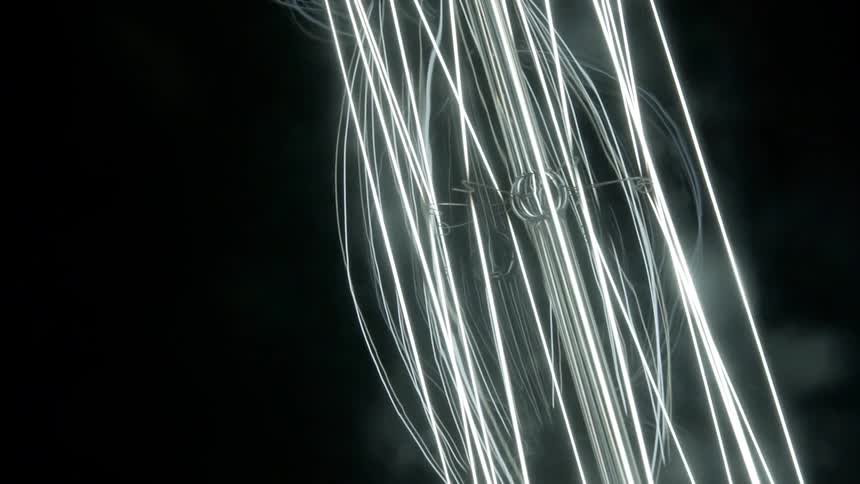 A pattern of light neon and smoke