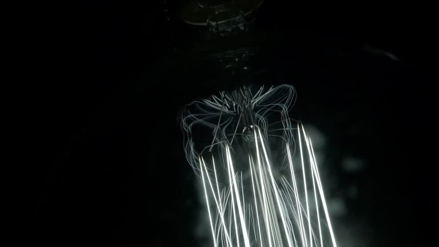 Bright beams of light coming off of a structure