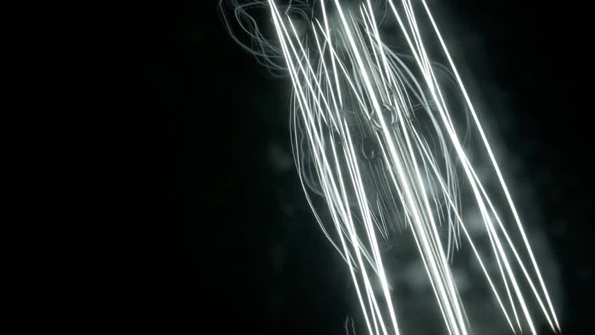 Glowing lines surround a floating sphere