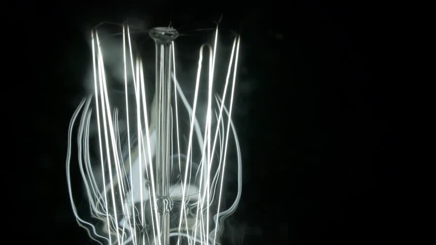 Abstract shapes are formed by lights and lasers
