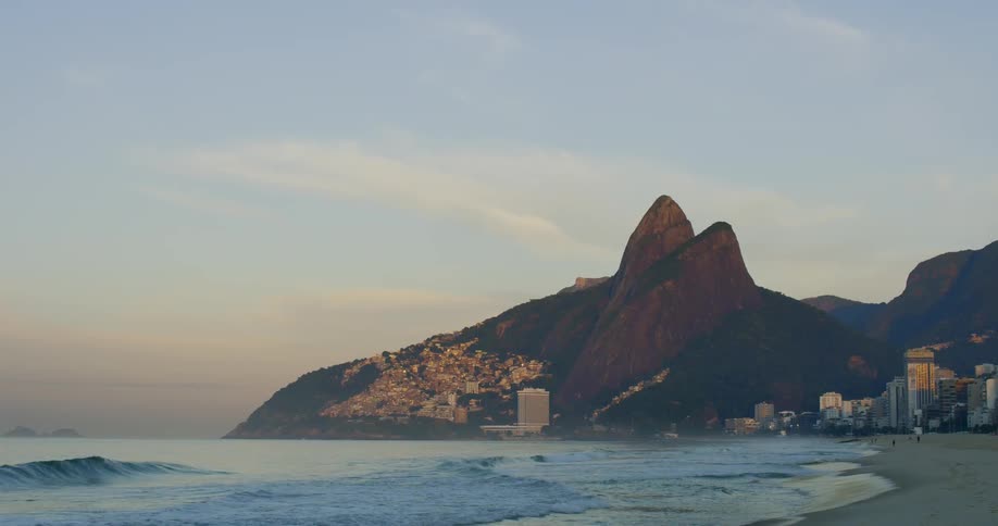 Ipanema beach coastal city with buildings on the beach near a mountain range and ocean