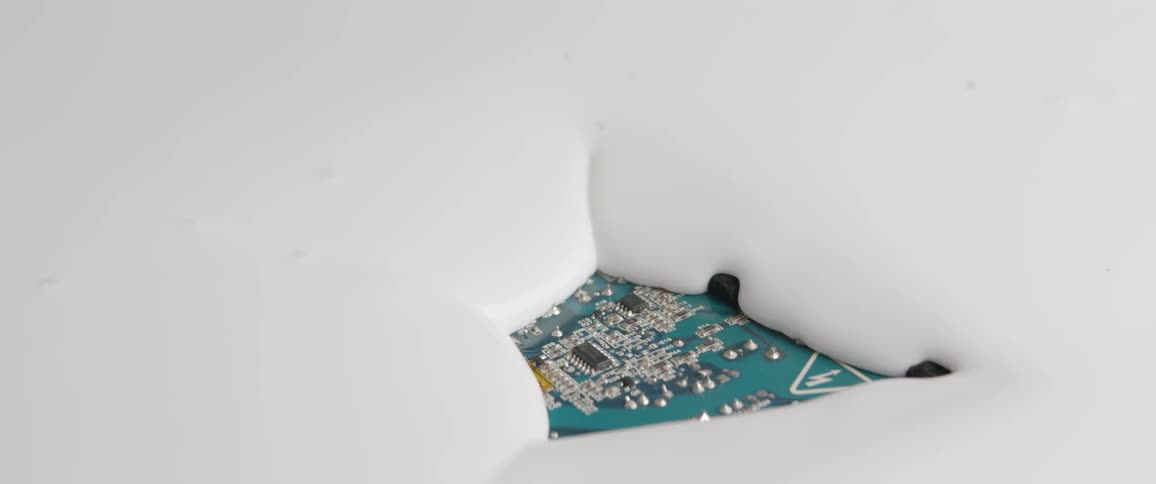 White paint flows overa circut board