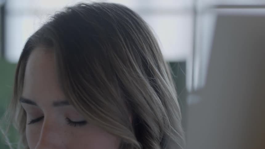 A woman looking around a room
