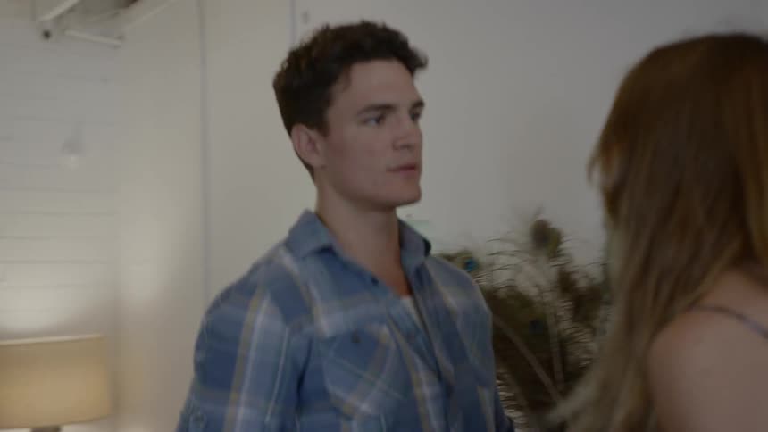 Man stops and quarrels blonde girl who is leaving the room