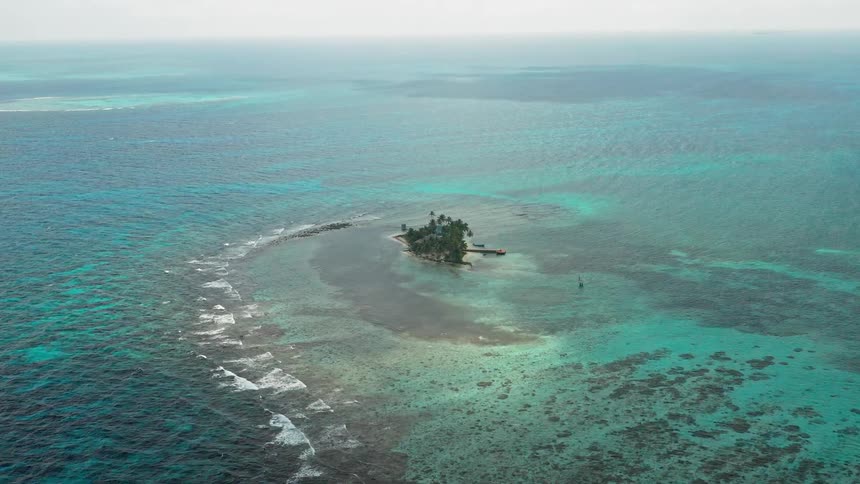 There is a tiny island in the middle of the ocean